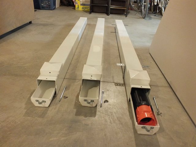 Fence post rv sewer hose storage